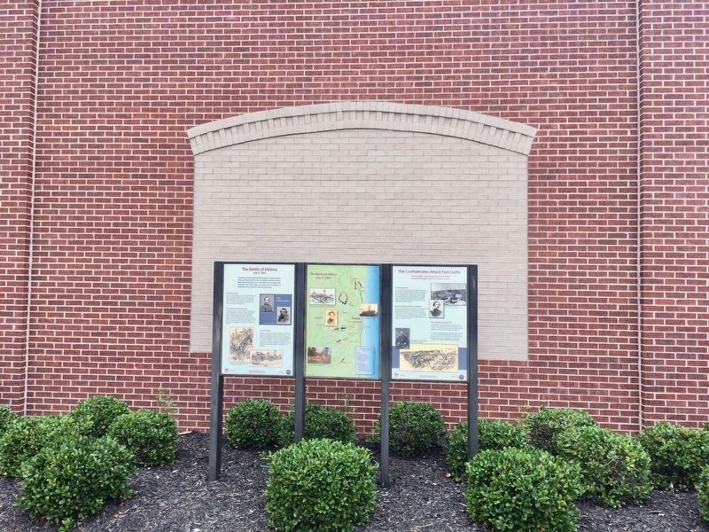 The Battle of Helena Marker on left & map in middle against library wall. image. Click for full size.