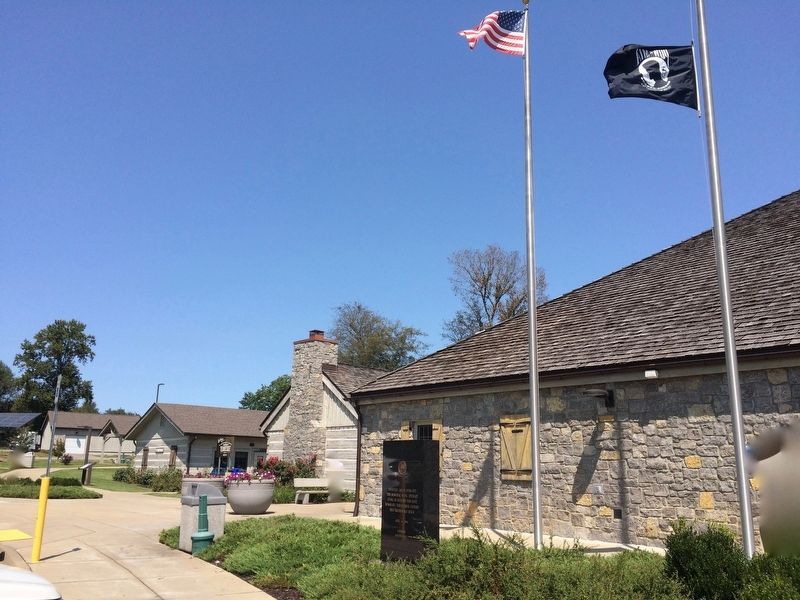Marker on far left with Veterans memorial to right. image. Click for full size.