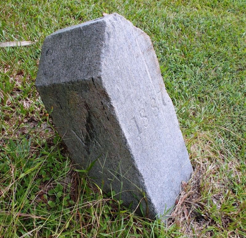 A closeup of the boundary markers north side. image. Click for full size.