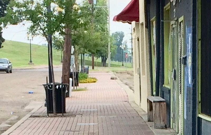 Donald Hayes Brown Marker in far distance near 3rd trash receptacle. image. Click for full size.