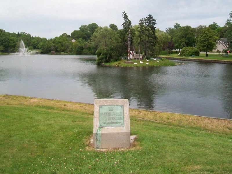 Totem Pole and Marker at Sullivan's Pond Park. Click for full size. Totem Pole and Marker at Sullivan's Pond Park image. Click for full size.
