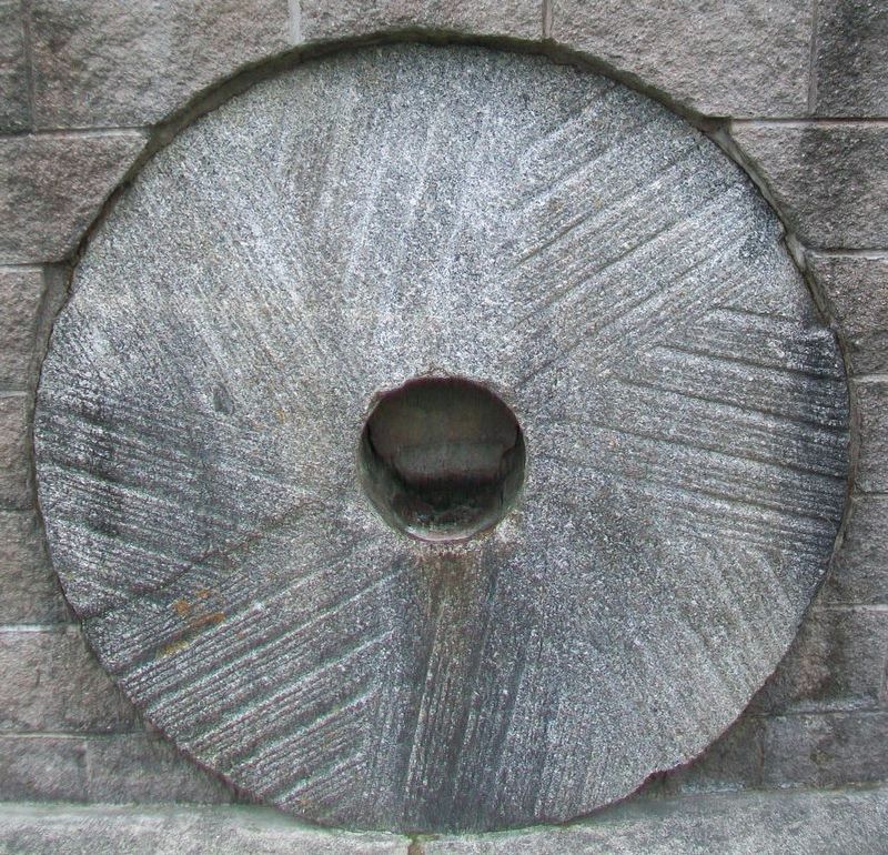 Millstone Portion of Monument (NE face). Click for full size. Millstone Portion of Monument (NE face) image. Click for full size.