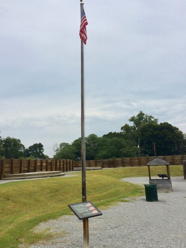 Flags over Fort Curtis Marker and fort flag. image. Click for full size.