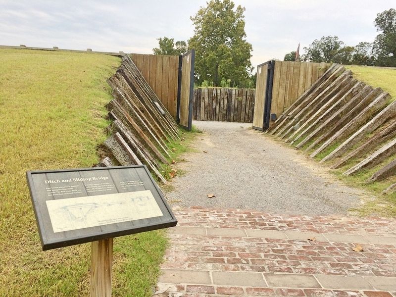 Entrance to the New Fort Curtis with flag barely visible on right over top of wall. image. Click for full size.