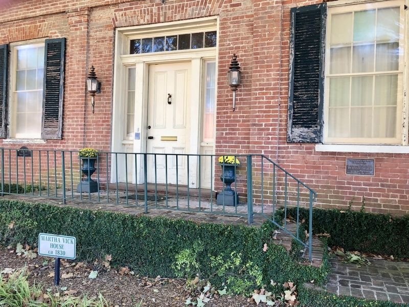 Closeup of home entrance wiht NRHP plaque. image. Click for full size.