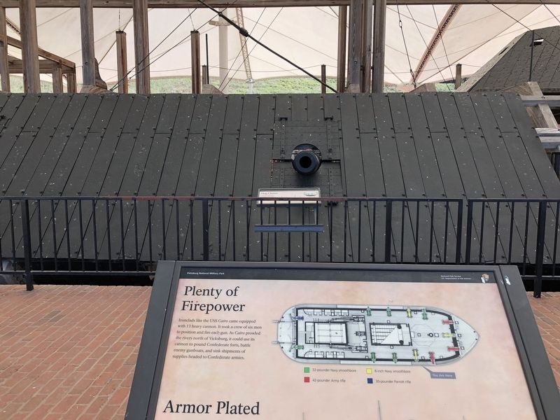 View of marker and the U.S.S. <i>Cairo</i> with a 32-pounder smoothbore cannon. image. Click for full size.