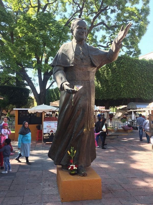 A nearby statue of Pope John Paul II image. Click for full size.