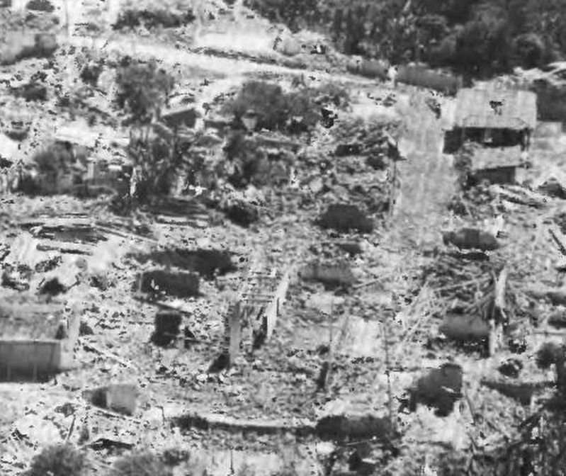 Destruction of the nearby town of Tecpán in 1976. image. Click for full size.