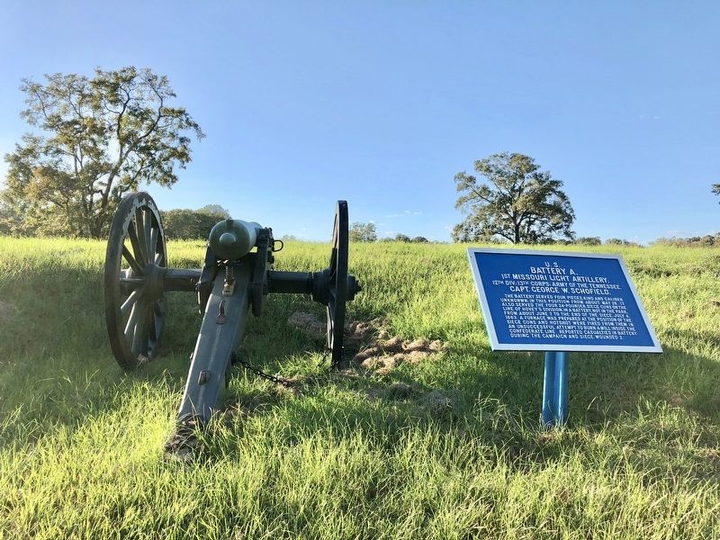 Marker next to period gun. image. Click for full size.