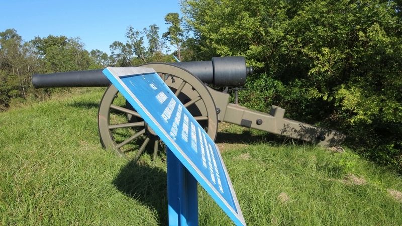 View of marker looking north towards gun. image. Click for full size.