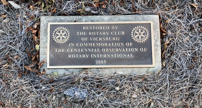 Restoration plaque at base of memorial. image. Click for full size.