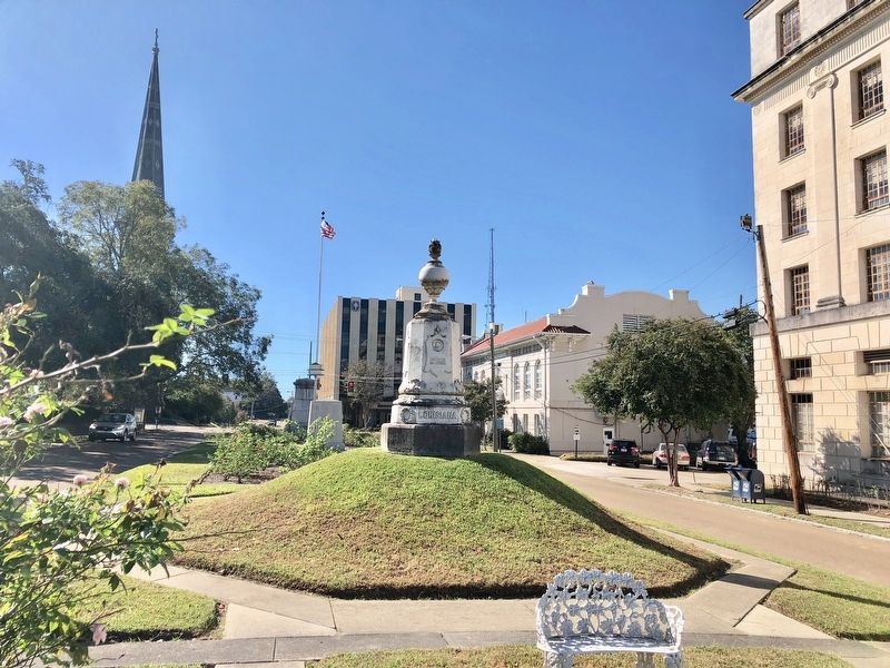 Memorial can be seen in distance behind American flag. image. Click for full size.