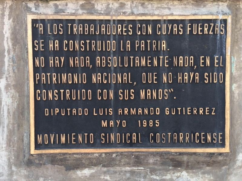 An additional nearby marker at the base of the statue dedicated to Costa Rican workers image. Click for full size.