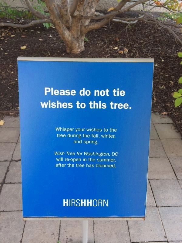 Seasonal Sign in front of the Wish Tree image. Click for full size.