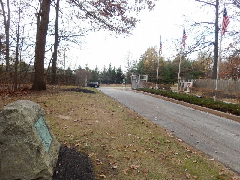 World War I Memorial Marker-in the background are the flags at the entrance gate. Click for full size. World War I Memorial Marker-in the background are the flags at the entrance gate image. Click for full size.