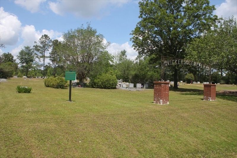 Vickers Cemetery Marker and surrounding cemetery image. Click for full size.
