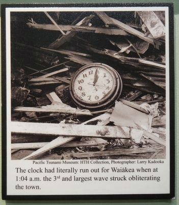 Waiakea Social Settlement Clock as found in the rubble. image. Click for full size.