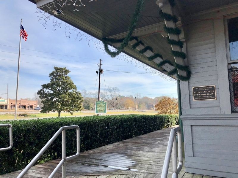 View of depot near railroad tracks and NRHP plaque.. Click for full size. View of depot near railroad tracks and NRHP plaque. image. Click for full size.