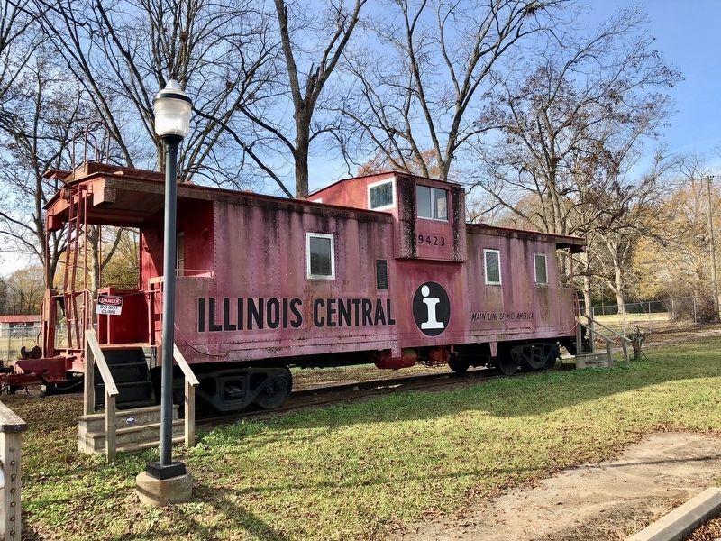 Illinois Central Railroad boxcar next to depot.. Click for full size. Illinois Central Railroad boxcar next to depot. image. Click for full size.