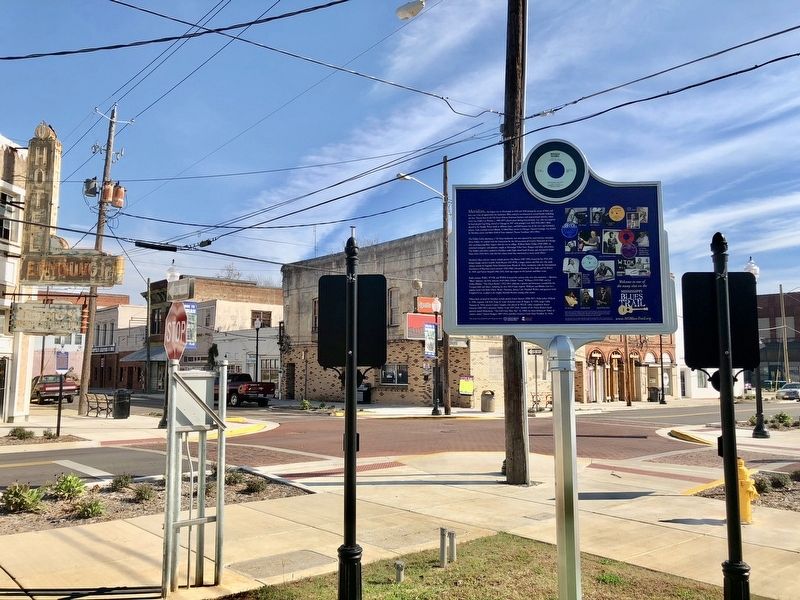 View of marker and the former Business District. image. Click for full size.
