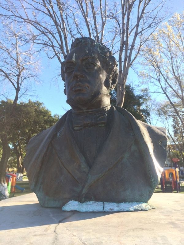 A bust of Bernardino Rivadavia tops the monument image. Click for full size.