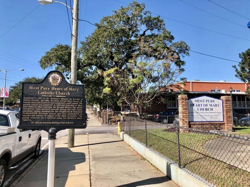 Marker with part of school building in background.. Click for full size. Marker with part of school building in background. image. Click for full size.