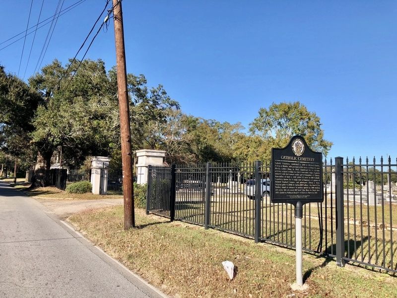 Catholic Cemetery Marker and entrance gates. image. Click for full size.