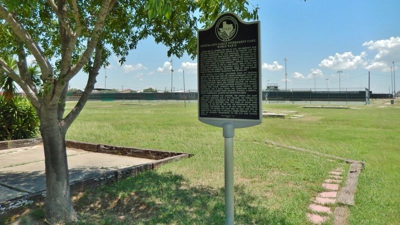 Crystal City Family Internment Camp Marker (<i>wide view; internment camp site in background</i>) image. Click for full size.
