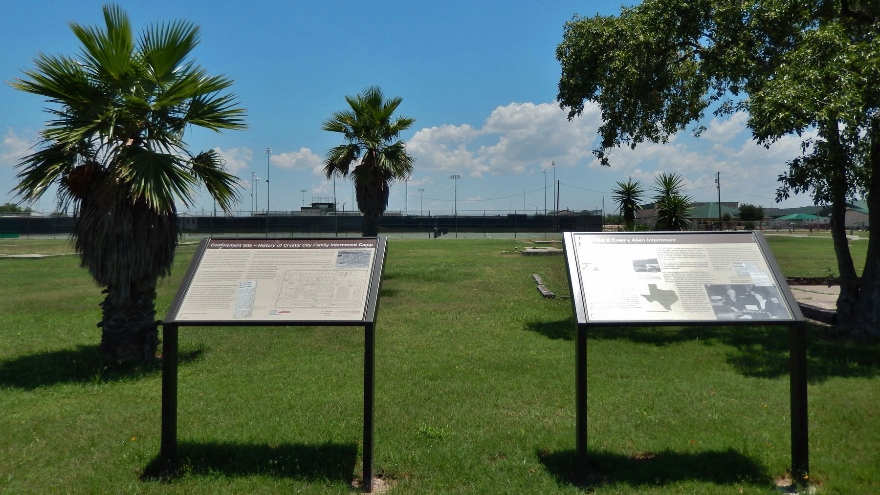 Enemy Alien Internment Marker (<i>wide view: camp site in background; adjacent marker on left</i>). Click for full size. Enemy Alien Internment Marker (<i>wide view: camp site in background; adjacent marker on left</i>) image. Click for full size.