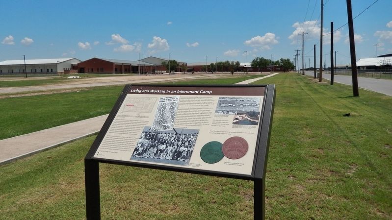 Internment Camp Marker (<i>wide view; school in background, on internment camp site</i>) image. Click for full size.
