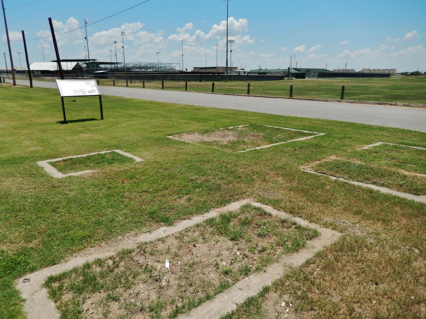 Internment Camp Marker (<i>wide view; foundation remains in foreground</i>). Click for full size. Internment Camp Marker (<i>wide view; foundation remains in foreground</i>) image. Click for full size.