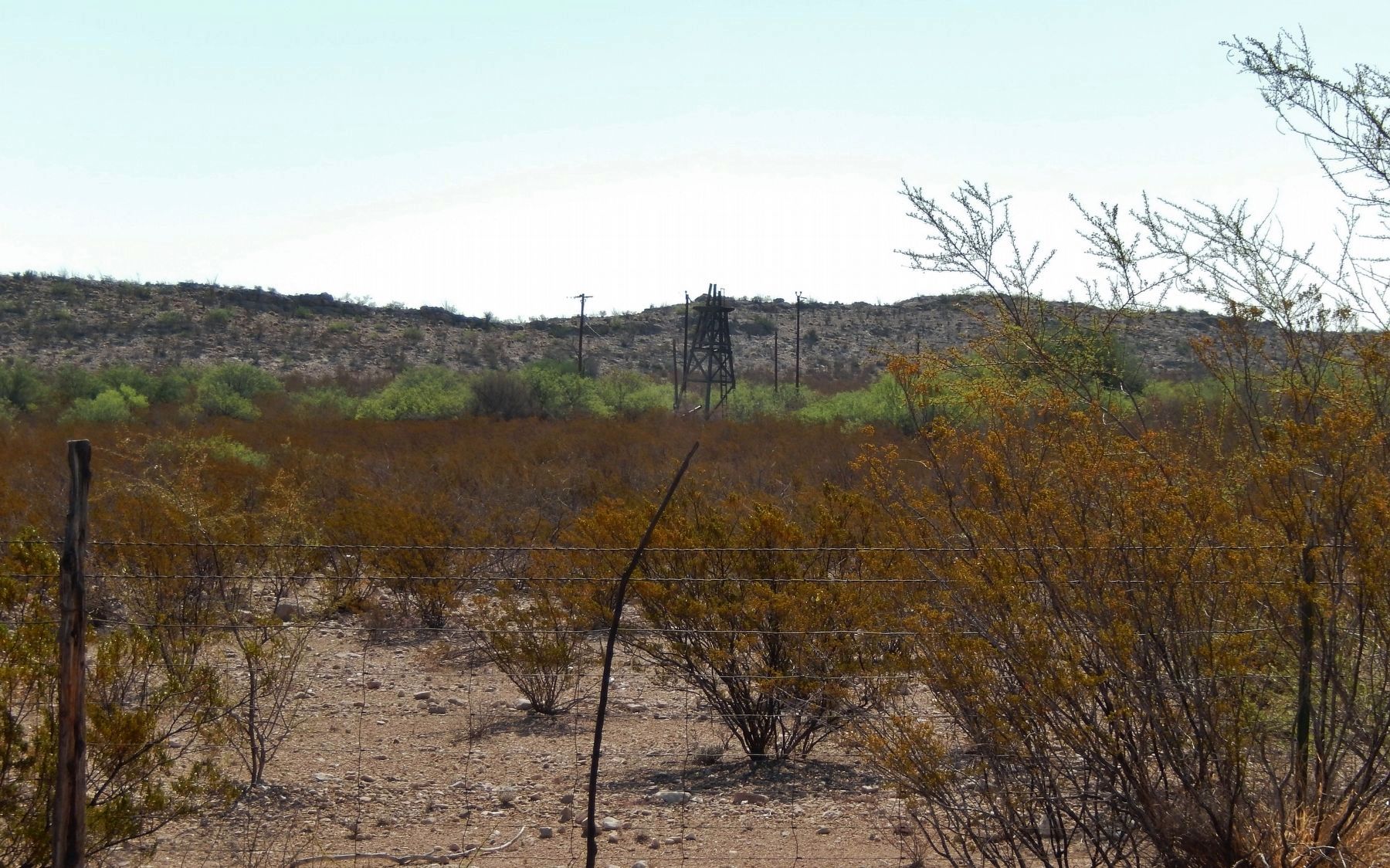 View of Rugged Landscape Beyond Marker. Click for full size. View of Rugged Landscape Beyond Marker image. Click for full size.