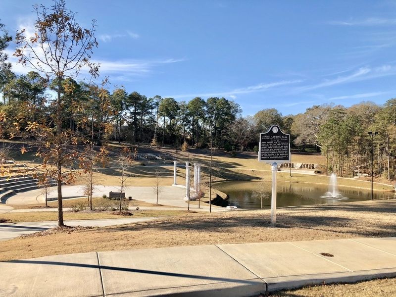 View of park with the Chinese terra-cotta warriors, installed in 2016, in far background. image. Click for full size.