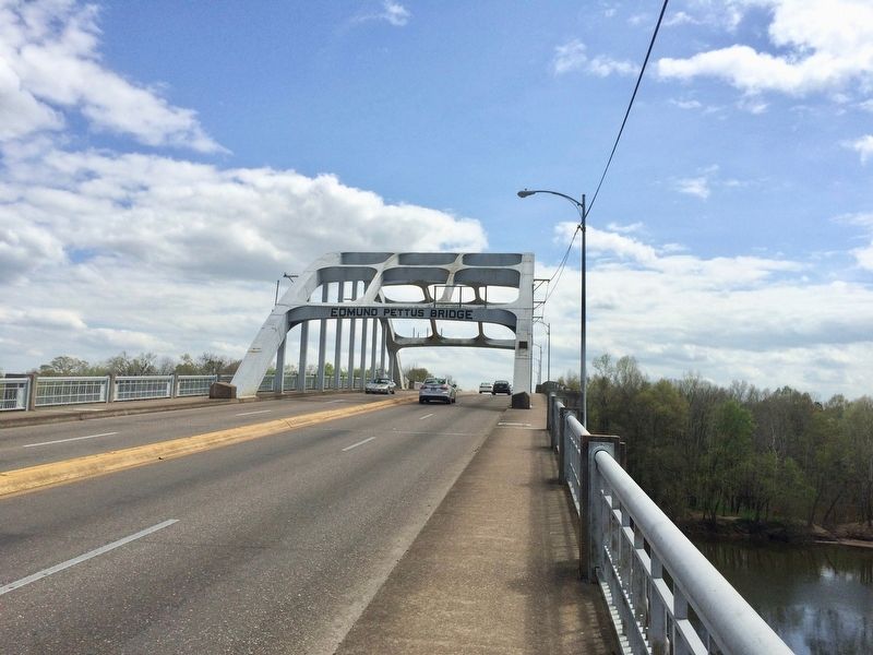 The Edmund Pettus Bridge, just beyond the marker on far left background. image. Click for full size.