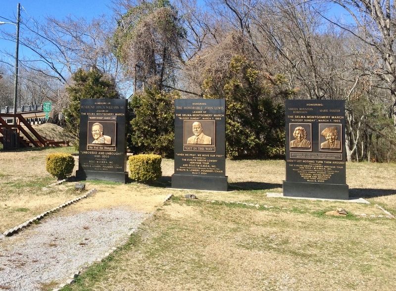 Far right monument of three with the Alabama River just beyond the trees.. Click for full size. Far right monument of three with the Alabama River just beyond the trees. image. Click for full size.
