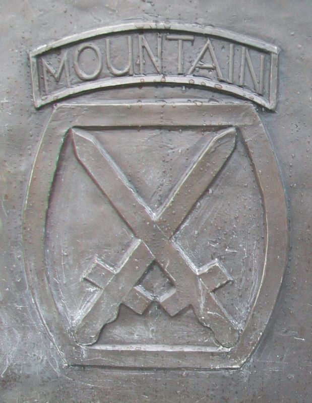 10th Mountain Division Emblem on Military Mountaineers Monument. Click for full size. 10th Mountain Division Emblem on Military Mountaineers Monument image. Click for full size.