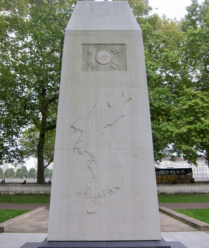 Korean War Memorial - rear, with relief of Korean flag and peninsula. Click for full size. Korean War Memorial - rear, with relief of Korean flag and peninsula image. Click for full size.