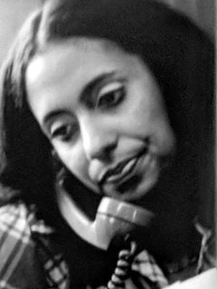 Cathy Hughes on telephone image. Click for full size.