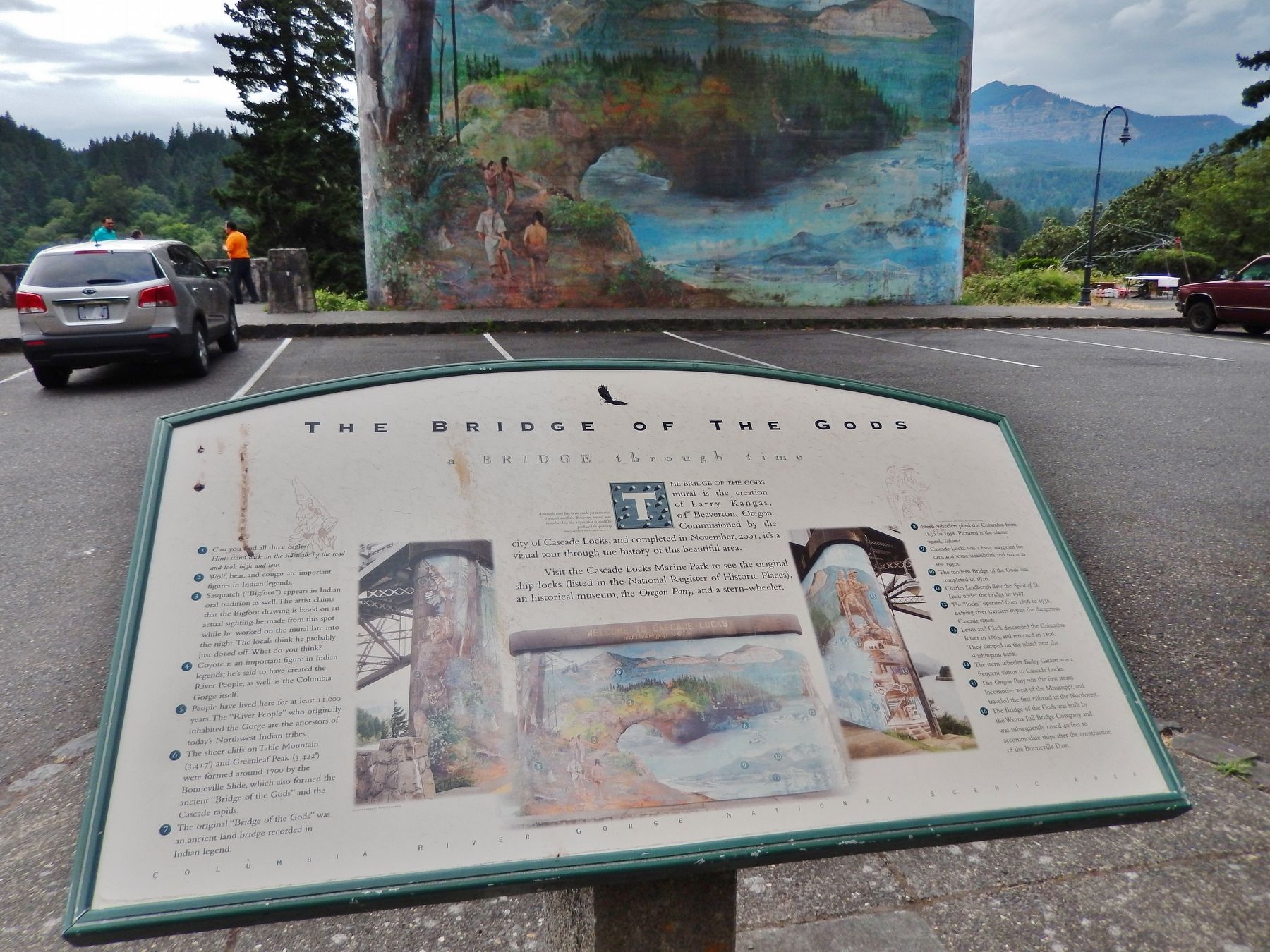 Bridge of the Gods Marker (<i>wide view; south bridge pier mural in background</i>) image, Touch for more information