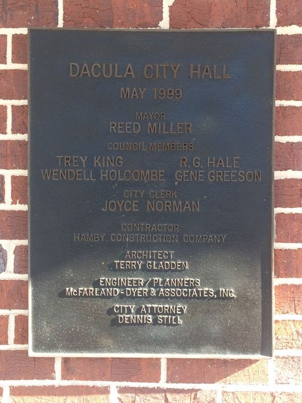 An additional dedicatory marker for the Dacula City Hall, to the right of its entrance image. Click for full size.