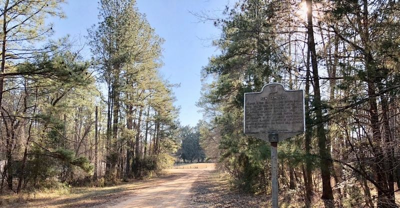 View of marker with New Cemetery just down the road in background.. Click for full size. View of marker with New Cemetery just down the road in background. image. Click for full size.