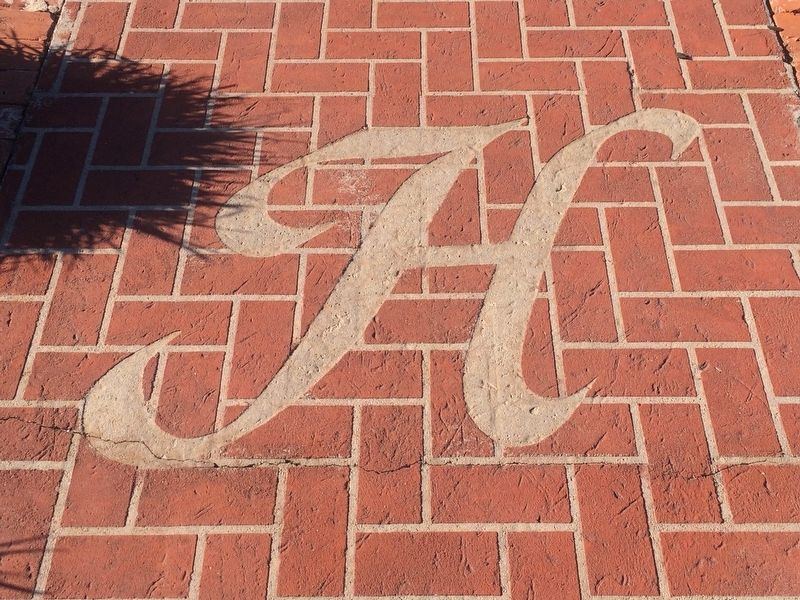 The Hinton House decorative 'H' on the entry walkway. image. Click for full size.