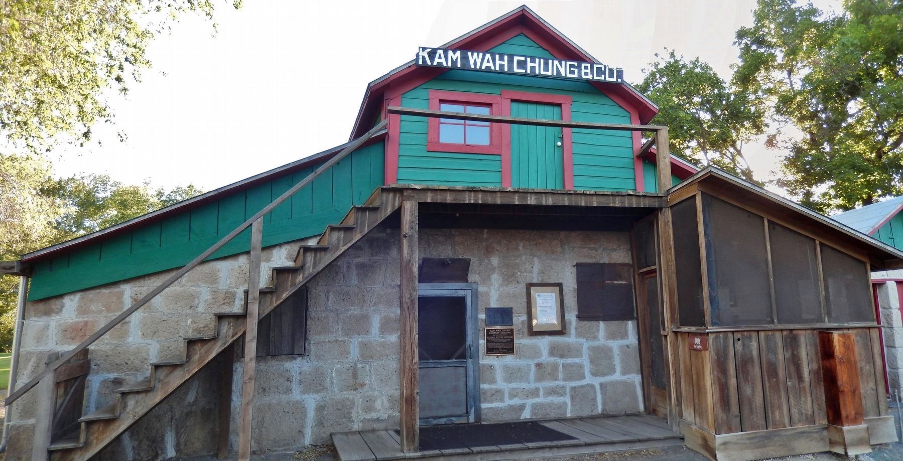 Kam Wah Chung Company Building (<i>wide view; marker visible right of door</i>) image, Touch for more information