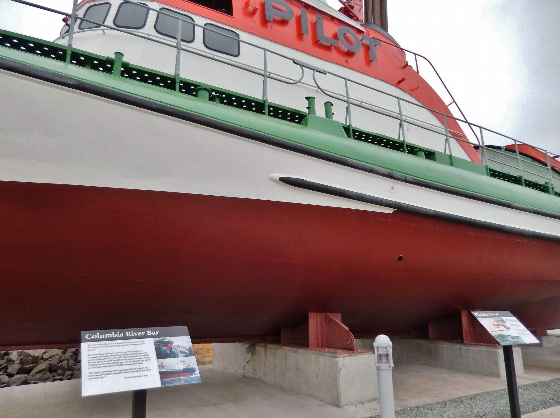 Pilot Boat Peacock Marker (<i>wide view; showing adjacent marker on left</i>). Click for full size. Pilot Boat Peacock Marker (<i>wide view; showing adjacent marker on left</i>) image. Click for full size.