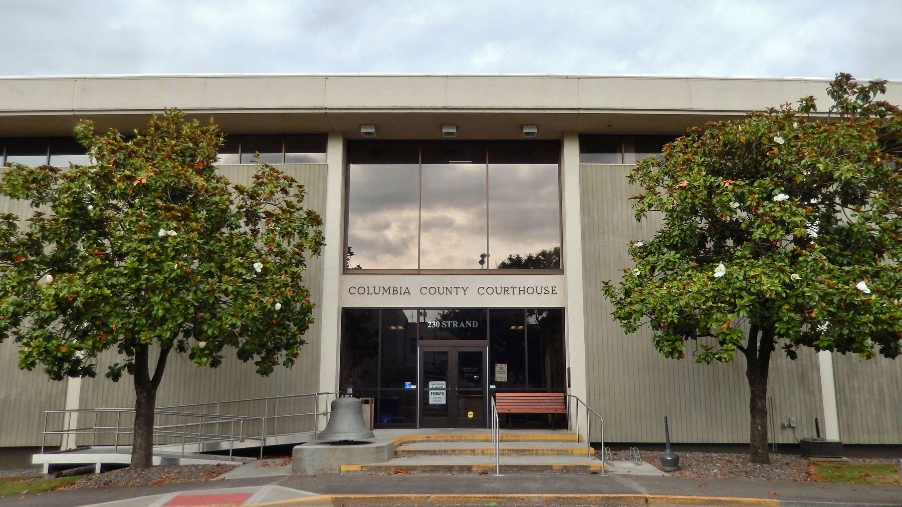 Columbia County Courthouse (<i>west entrance; marker and bell visible left of the door</i>). Click for full size. Columbia County Courthouse (<i>west entrance; marker and bell visible left of the door</i>) image. Click for full size.