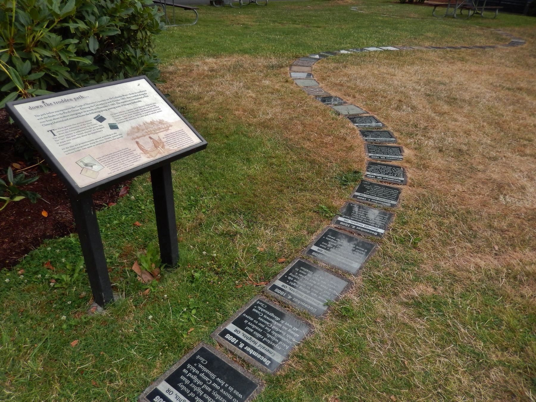 "down the trodden path..." Marker (<i>wide view; showing black granite tiles along the path</i>) image. Click for full size.