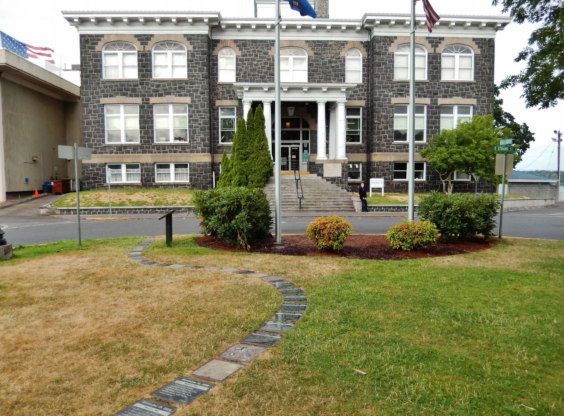 "down the trodden path..." Marker (<i>wide view; old Columbia County Courthouse in background</i>) image. Click for full size.