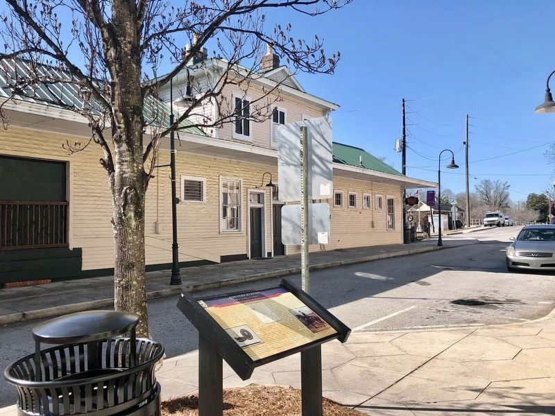 View of Marker and former Conyers Train Depot (Now the Conyers Welcome Center). image. Click for full size.