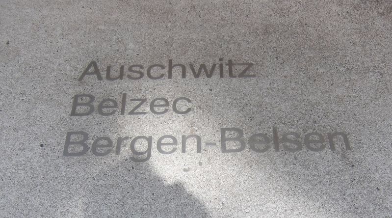 Example of concentration camp names surrounding the memorial image. Click for full size.