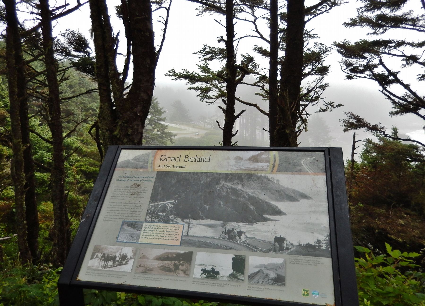 Road Behind And Sea Beyond Marker (<i>wide view</i>) image, Touch for more information